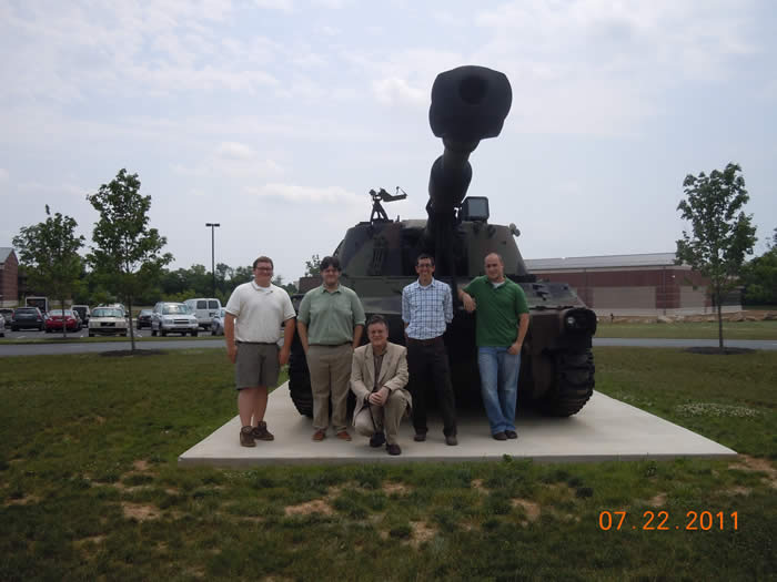 It's a scary, large, parked tank on the ground with a cannon pointed at the camera